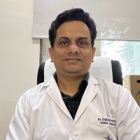 Dr. Tarun Mathur